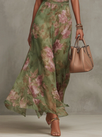 Lidia | Elegante vestido largo halter con estampado floral